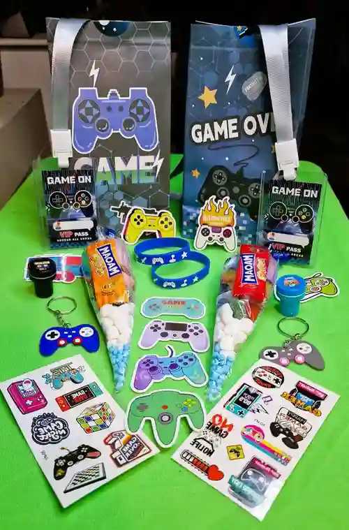 Blue gaming party bags with sweet cones, VIP lanyards and video game-themed extras