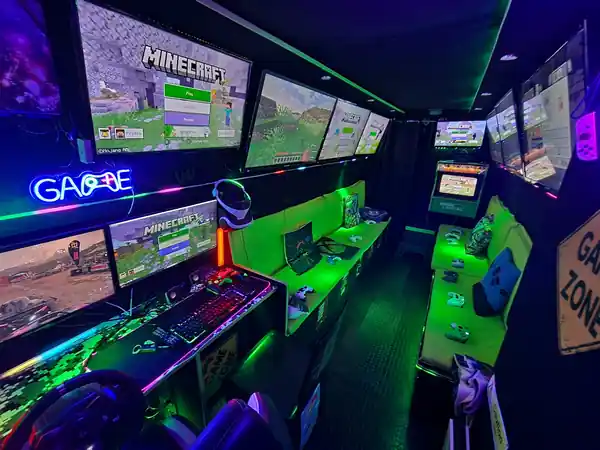 Inside the Streetside Gaming Bus in Ingatestone with multiple gaming screens, consoles and Minecraft ready to play.