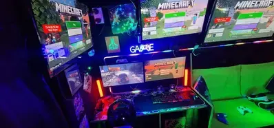 Gaming PC and Minecraft screens inside the Streetside Gaming Bus in Maldon