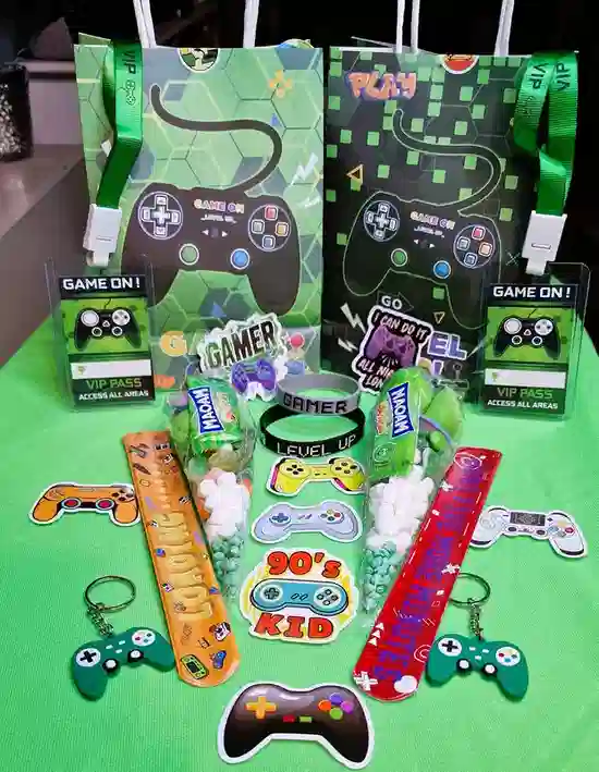 Green gaming party bags with sweet cones, VIP gamer lanyards and controller-themed extras