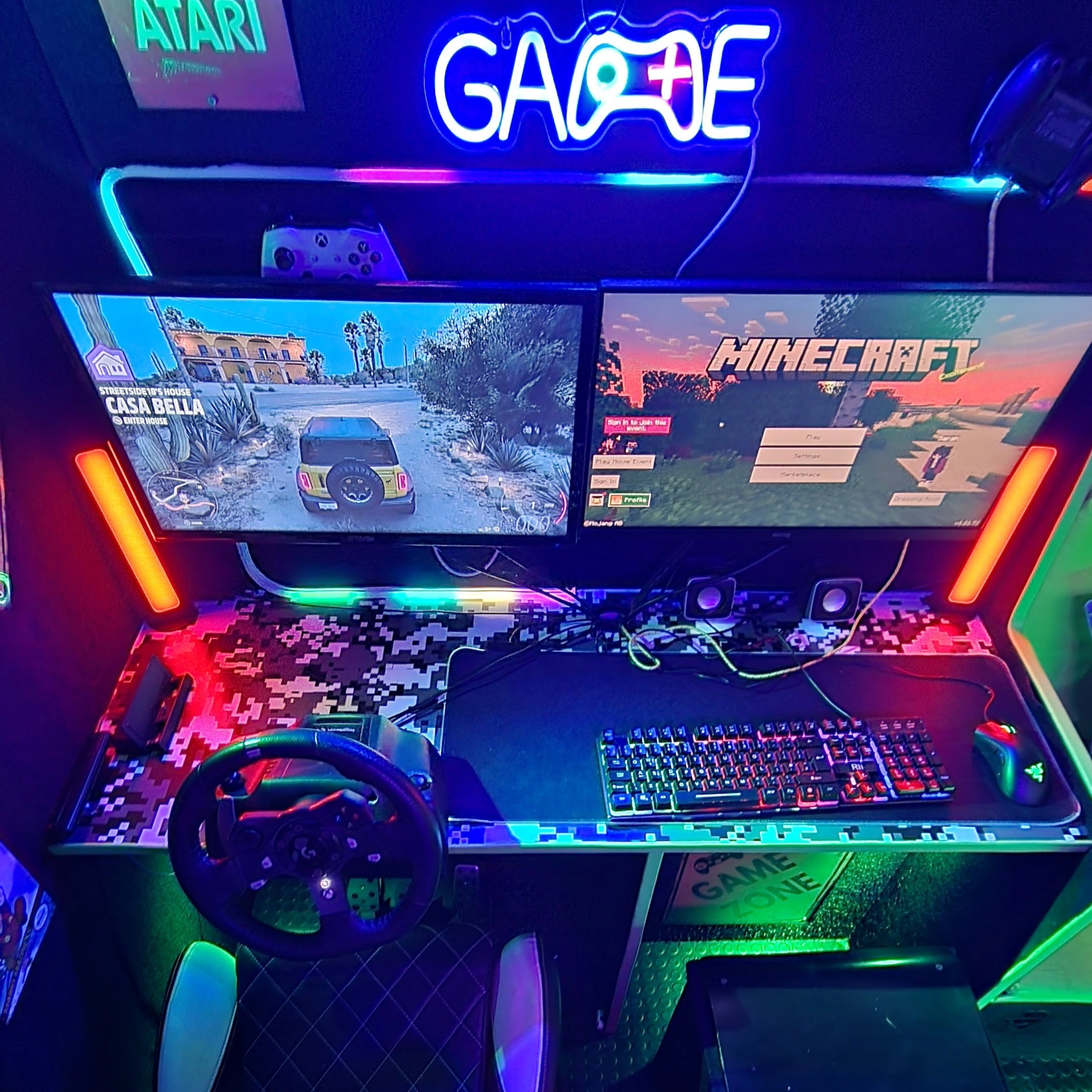 Gaming PC and racing simulator setup inside Streetside Gaming Bus in Essex
