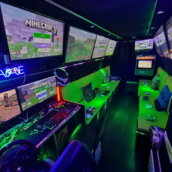 Inside the Streetside gaming bus in Chelmsford with Minecraft screens and gaming PC